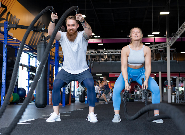 people working out at a crunch gym