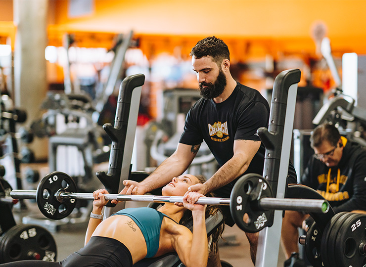 man with crunch personal trainer
