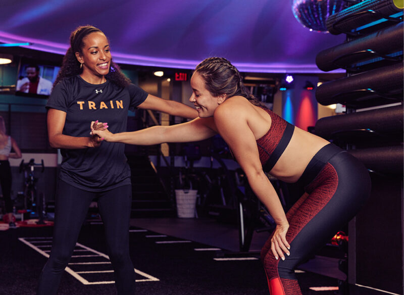 woman with personal trainer